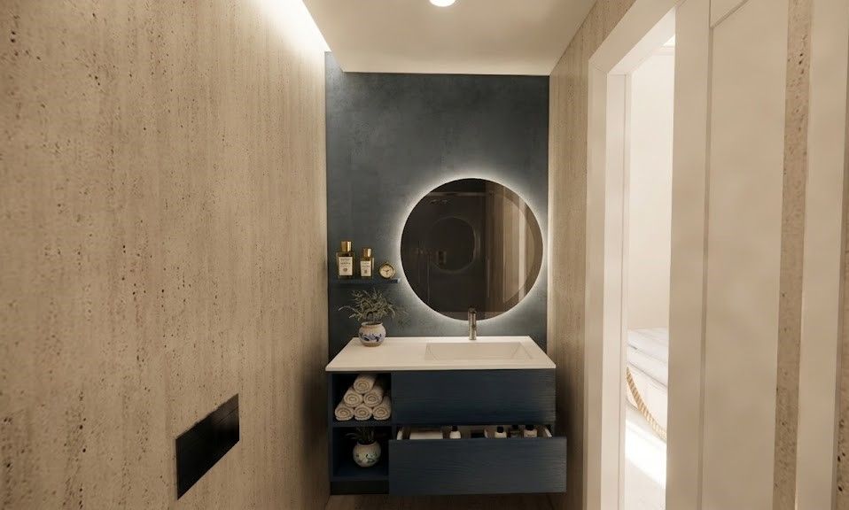 Bagno Camera Chiaia: mobile blu notte e specchio rotondo illuminato